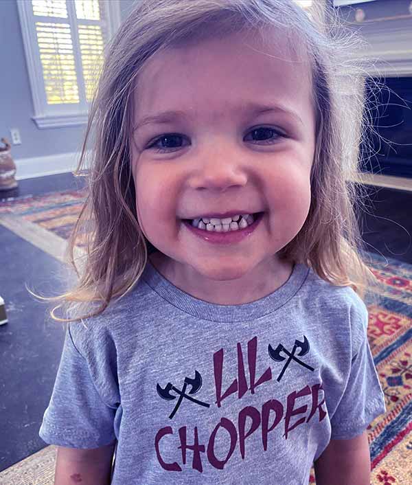 Image of Jennifer’s daughter, Gweny wearing Choppin Charlie t-shirt
